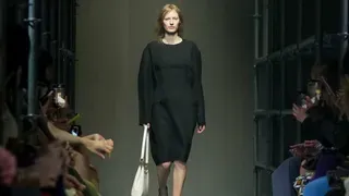 Prada Reconstructs Femininity Starting with the Little Black Dress Fit to Dark Times